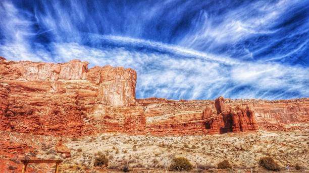 Cloud cap over Mt Kinesava in Zion National Park as seen on late summer day from Rockville Utah
