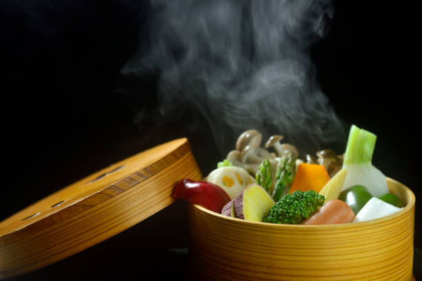 istock Steamed vegetables with rising steam 2184415626