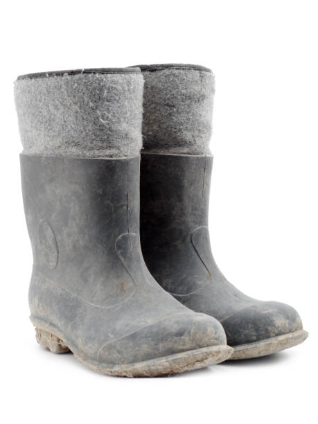 istock Dirty rubber-soled felt insulated boots 2184416377
