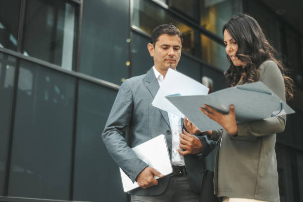 istock Business Meeting Outside Office Building 2184417547