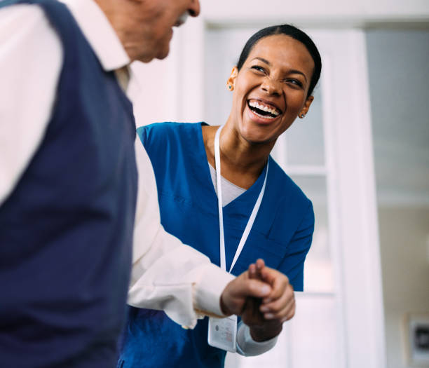 istock Nurse Assisting Elderly Man with Care and Compassion 2184430221
