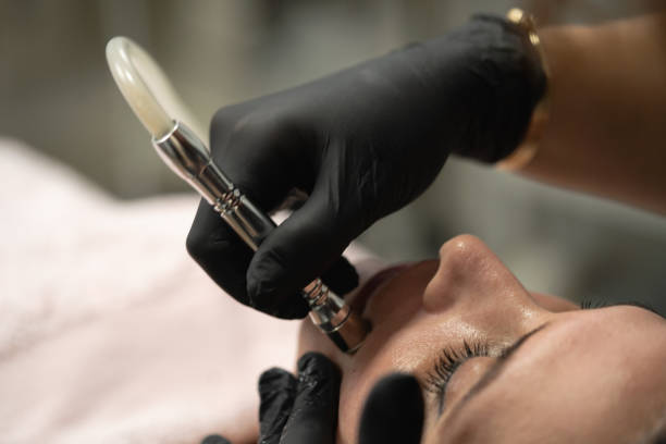istock facial treatment with diamond tip demoabrasion 2184430751