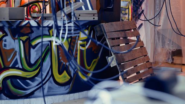 istock Electric cables hanging in underground location 2184432723