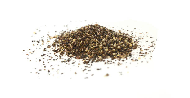 istock Powder black peppercorns, isolated on white background 2184432802