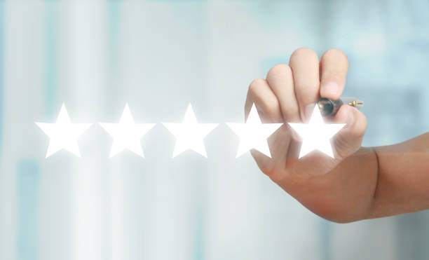 istock Rise on increasing five stars in human hand, Increase rating 2184434054