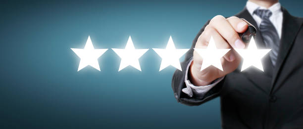 istock Rise on increasing five stars in human hand 2184434057