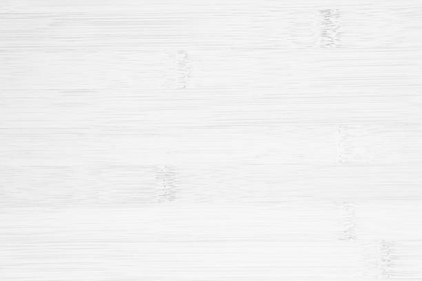 istock White wooden desk texture background, Top view. Abstract top bar table wood bamboo pattern nature. Design wall vintage interior kitchen. Bamboo skin cutting board empty for displaying products. 2184435603