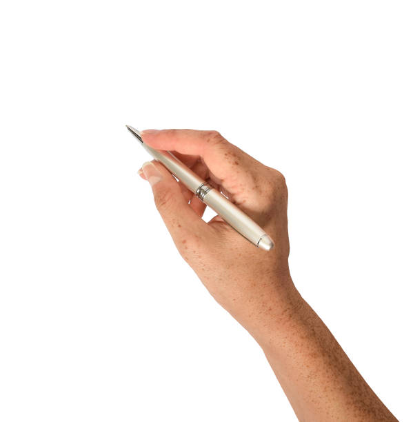 istock Top view woman's hand holding pen writing isolated cutout 2184446366