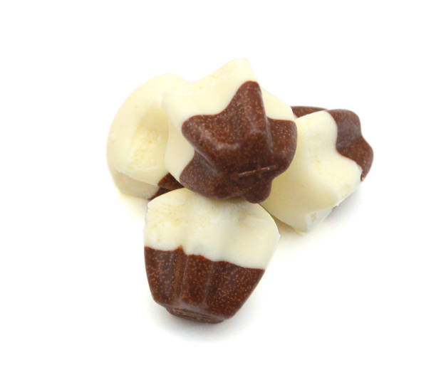 istock Chocolate candies isolated on white background 2184446684