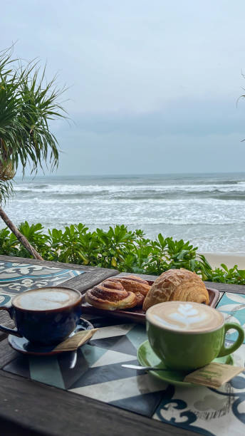 istock Morning Coffee by the Beach with Pastries 2184447972