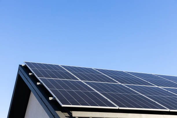 istock Solar panels system installed on house metal sheet roof, alternative energy 2184454257