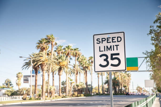 istock American speed limit sign displaying 35 mph, compliant with MUTCD guidelines, situated alongside a Nevada roadway indicating cars and vehicles can't go over 35 miles per hour. 2184457147