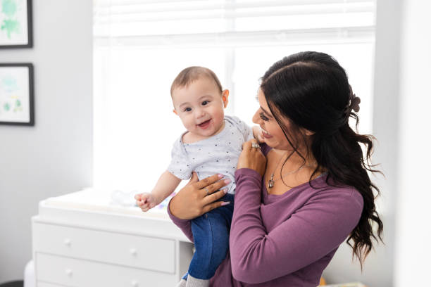 istock Mother bonds with her infant son 2184457336