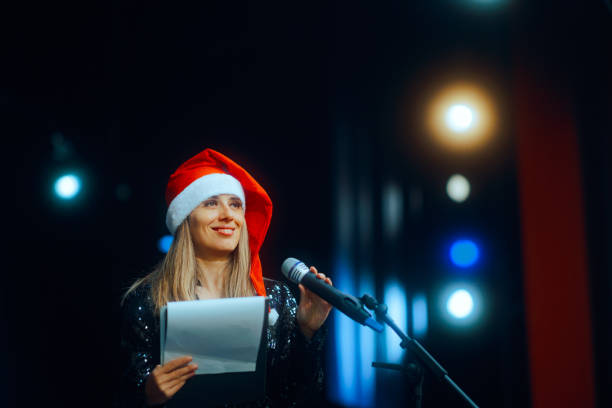 Happy entertainer during holidays concert introducing artists