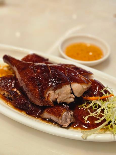 istock Crispy Hong Kong Roast Goose with Plum Sauce: Cantonese Culinary Delight 2184458540