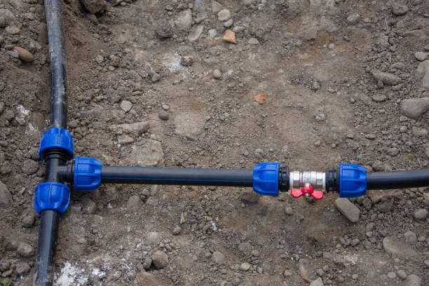 istock New water installations with faucets and black PVC pipes 2184458701