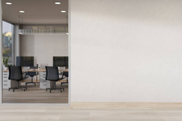 istock The interior design of a modern, minimalist office corridor features a blank white wall. 2184460098