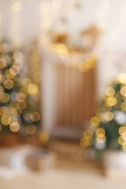 istock A blurry Christmas scene with a fireplace and two trees 2184461710
