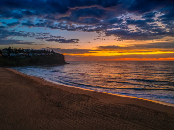 istock Pretty Sunrise at the seaside with rain clouds 2184467002