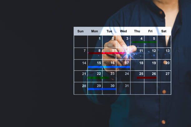 istock Businessman plans on a digital calendar and effective task management. 2184473259