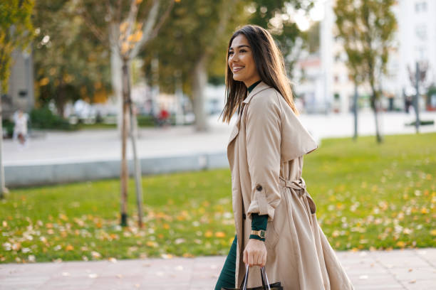 istock Happy woman on the way back from shopping 2184485947