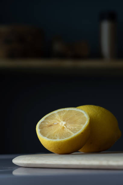 Close up of a lemon sliced open on the countertop