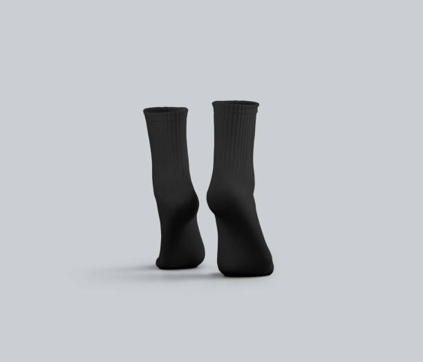 istock Black medium socks mockup 3D rendering, gaiters on tiptoes, back view, for design, pattern, branding. 2184492793