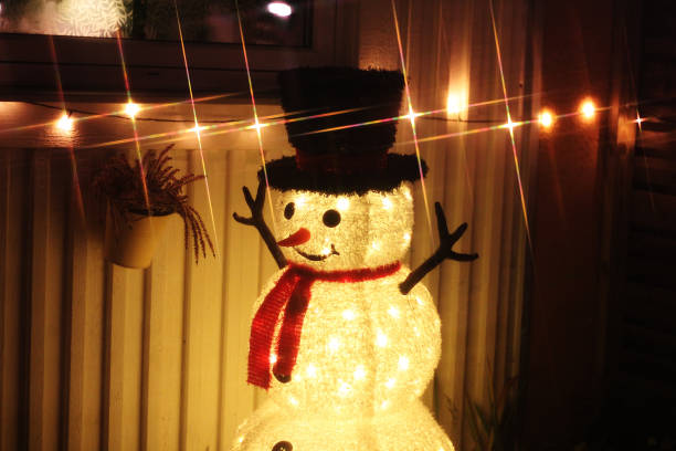 A glowing snowman being happy