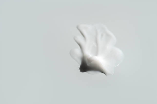 istock A smear of cream on a light background. Beauty concept. 2184493687