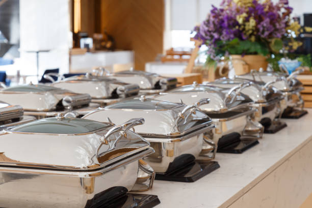 istock heating trays setup on the buffet line ready for service. breakfast and lunch buffet food catering banquet in hotel. 2184494681