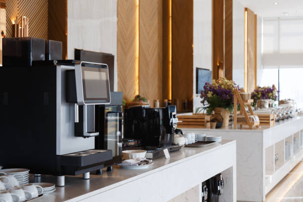 istock Coffee machine and heating trays setup on the buffet line ready for service. breakfast and lunch buffet food catering banquet in hotel. 2184494689