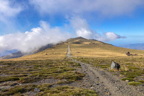 istock Cloudy over mountains on trail to Mulhacen peak 2184496608
