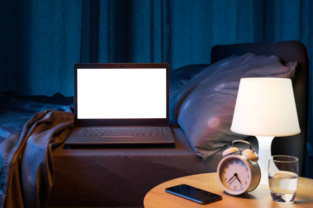 istock Laptop on the bed at home 2184503228