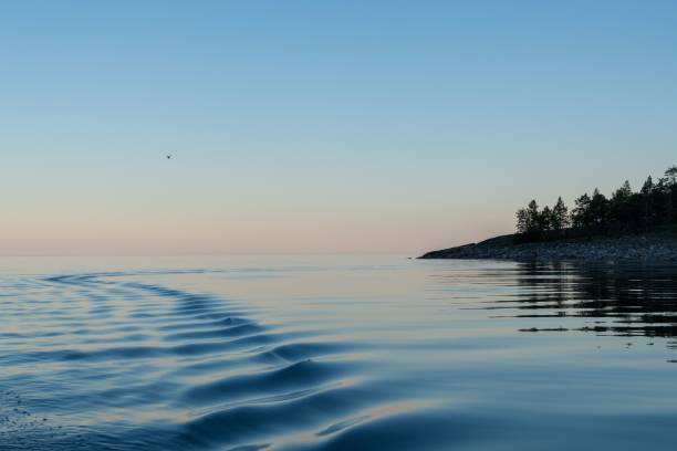 istock Tranquil seascape at sunset with rippling waves. 2184503635