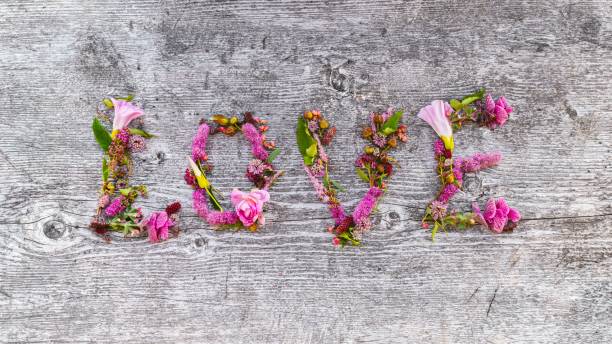 istock Floral 'LOVE' on rustic wood 2184503639