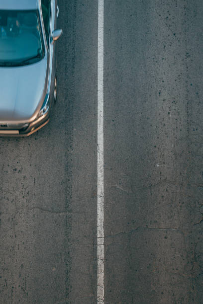 istock Top view of car on the road 2184506956