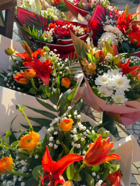 High angle shot of lot of bouquets of flowers in flower shop without people