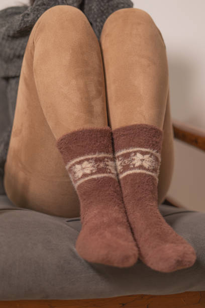 istock Cozy Winter Socks on a Comfortable Chair 2184510036