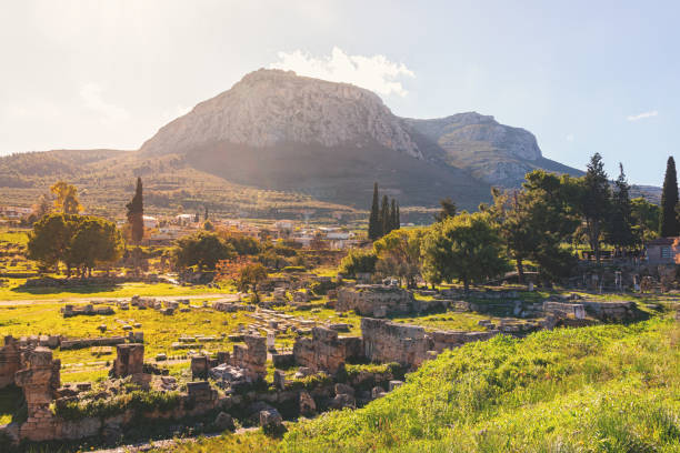 istock Corinth Archaeological Park. Panoramic view with ancient ruins in the foreground and the Acrocorinth mountain rising in the background. Corinth, Greece 2184510468