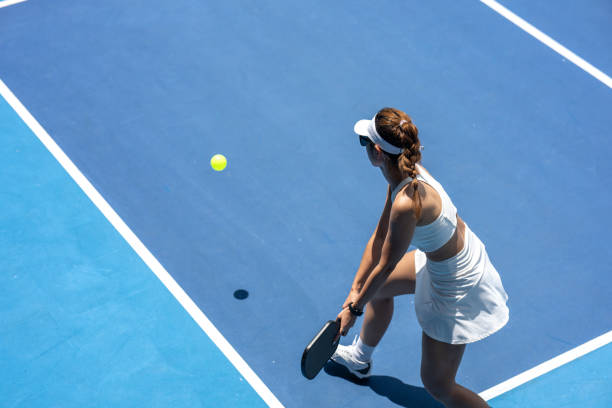 istock Perfecting the Backhand: Pickleball Action from Above 2184510671