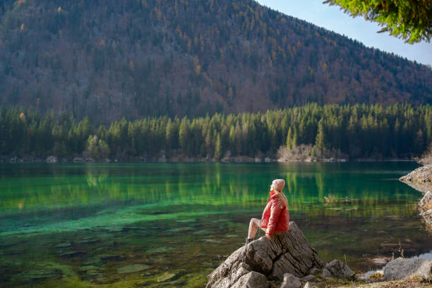istock woman tourist enjoying peace and tranquility 2184513130
