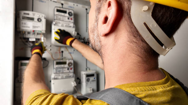 istock Technician working on a modern electricity power meter station in a building. 2184516148