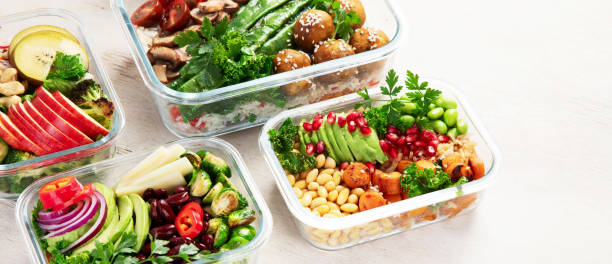istock Glass containers with fresh vegan food, ready for meal prepping. 2184516976