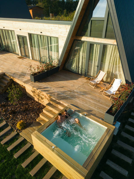 istock Couple having relaxing time in hot tub 2184518703