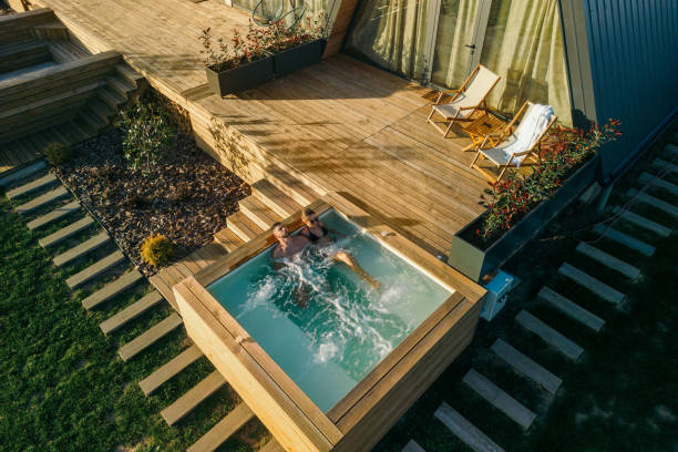 istock Couple having relaxing time in hot tub 2184518707