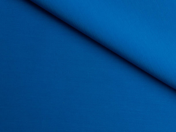 istock Blue fabric lies in beautiful folds. 2184520646