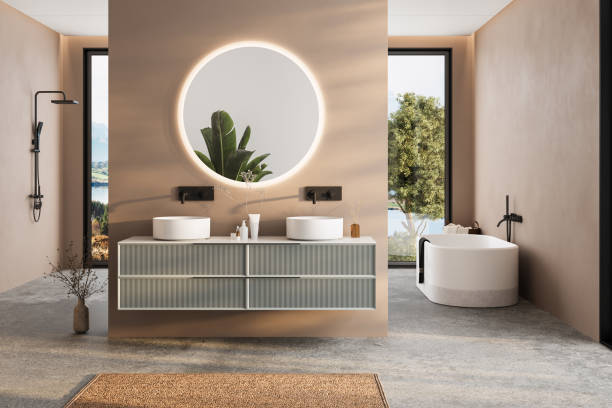 istock Modern minimalist bathroom interior, modern bathroom cabinet, white sink, wooden vanity, interior plants, bathroom accessories, bathtub and shower, white and beige walls, concrete floor. 2184523749