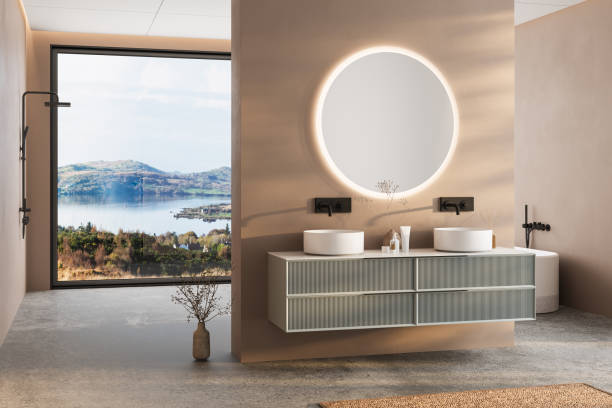istock Modern minimalist bathroom interior, modern bathroom cabinet, white sink, wooden vanity, interior plants, bathroom accessories, bathtub and shower, white and beige walls, concrete floor. 2184523754
