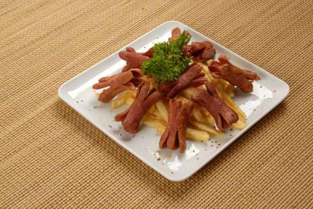 istock Snack plate of fried potatoes and fried sausage 2184525048