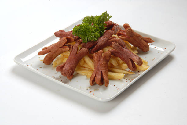 istock Snack plate of fried potatoes and fried sausage 2184525054